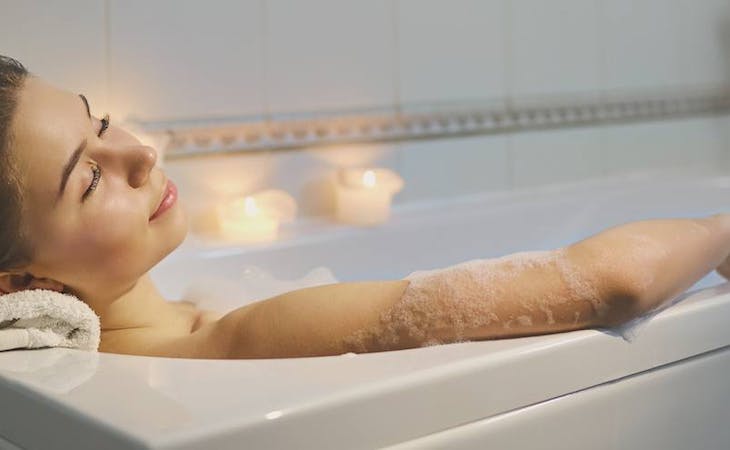 image of person taking relaxing bath before bed