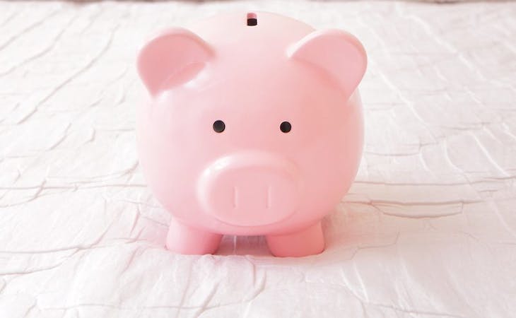 image of piggy bank on mattress