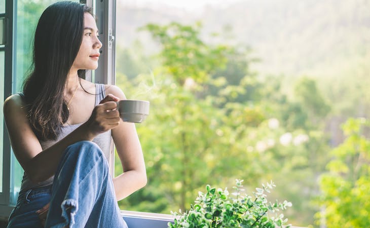 person drinking green tea in the afternoon