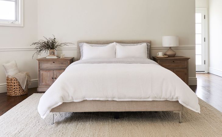 person rotating a mattress