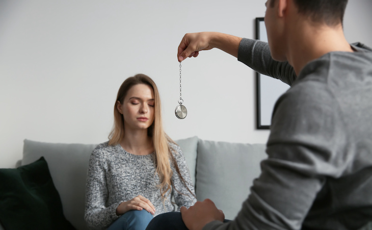 person undergoing sleep hypnosis