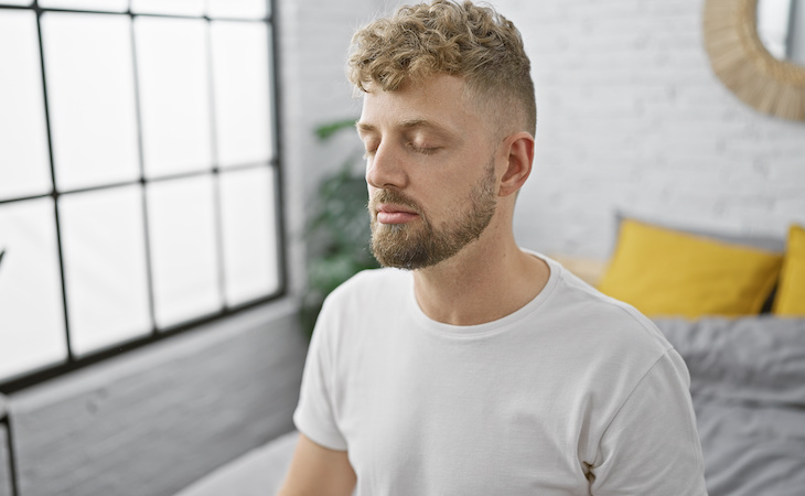 person practicing mindfulness as part of somatic therapy