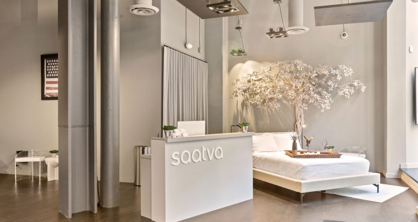 Saatva SF Interior with Tree and Check In Desk Closeup SlavaBlazerPhotography