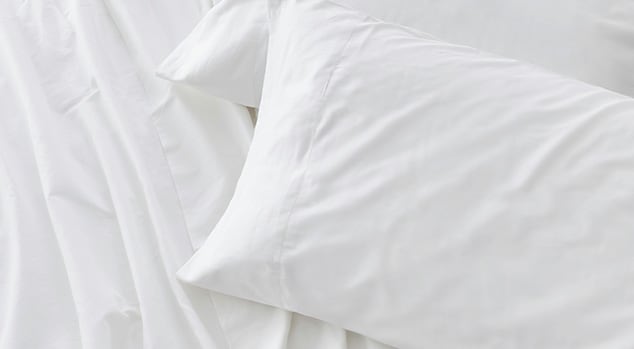 Saatva sheets with matching pillowcases.