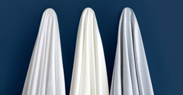 All three colors of Saatva sheets.